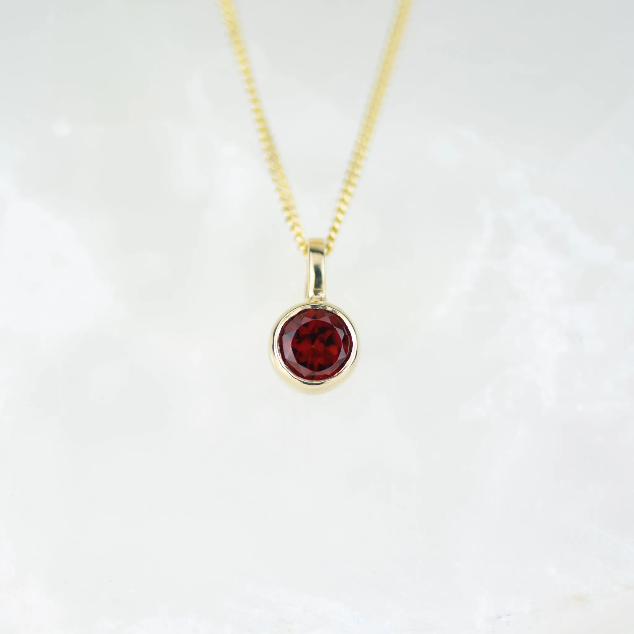 Gold 5mm Garnet Andromeda Pendant