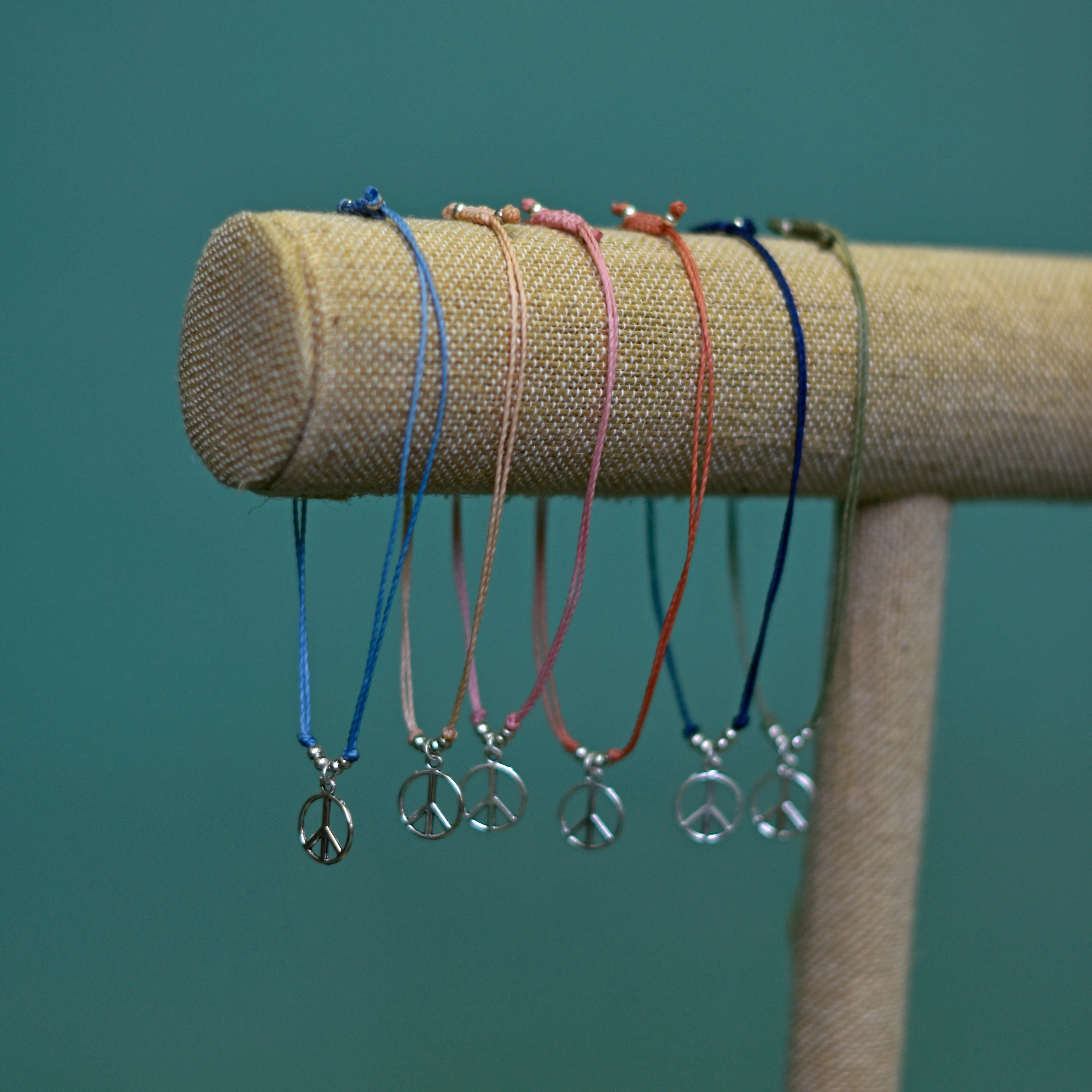 Peace String Charm Bracelet